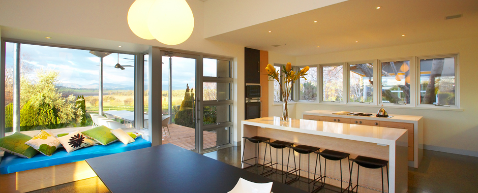 A Hinged Door leading outside from a Kitchen and Dining Room